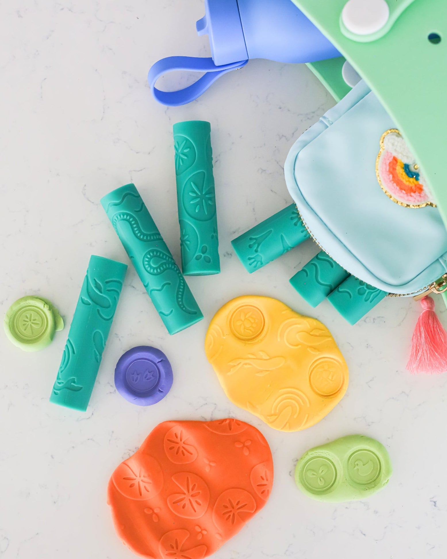 play dough rollers on a light surface